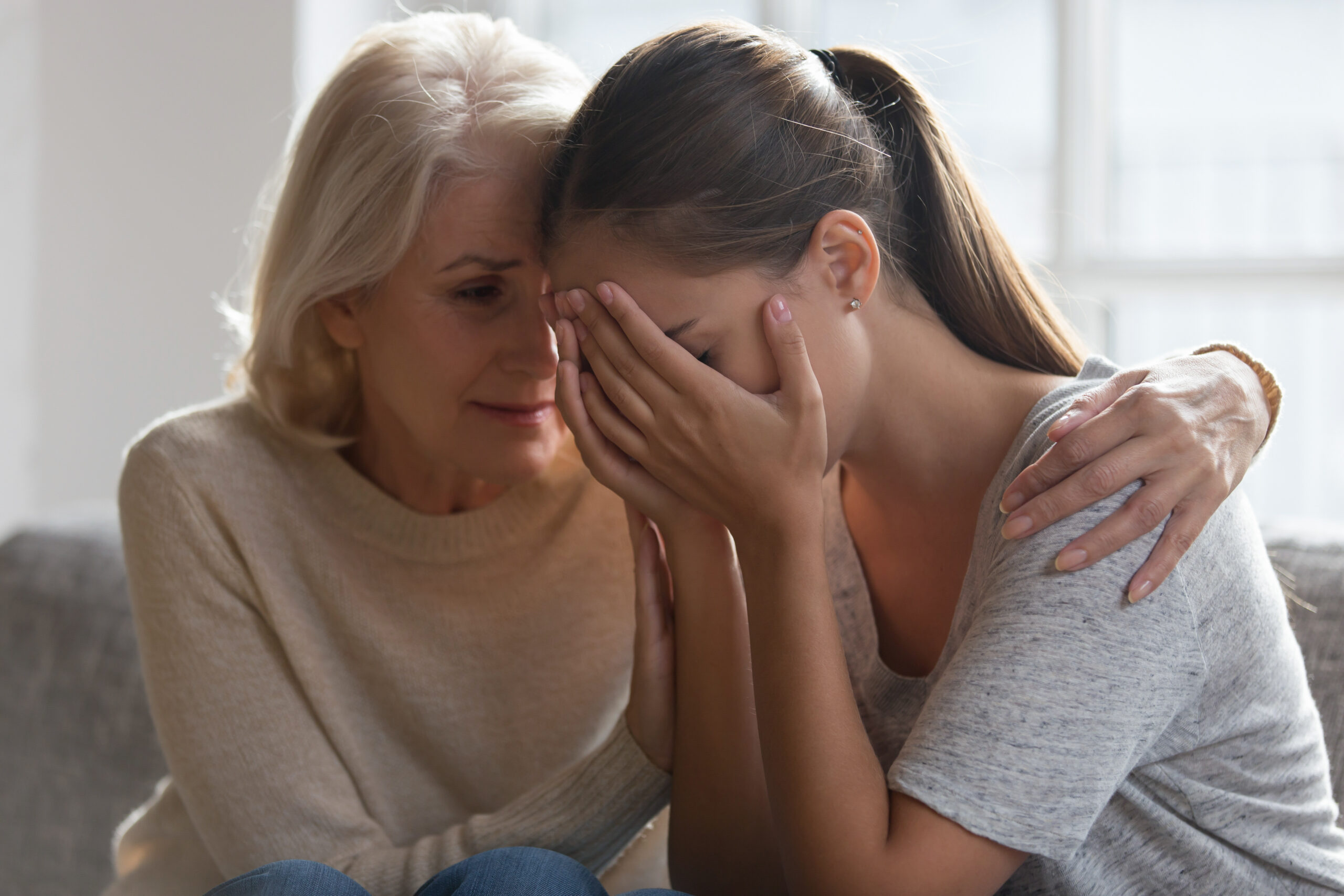 Worried,Aged,Mother,Embracing,Comforting,Grown,Up,Daughter,With,Broken